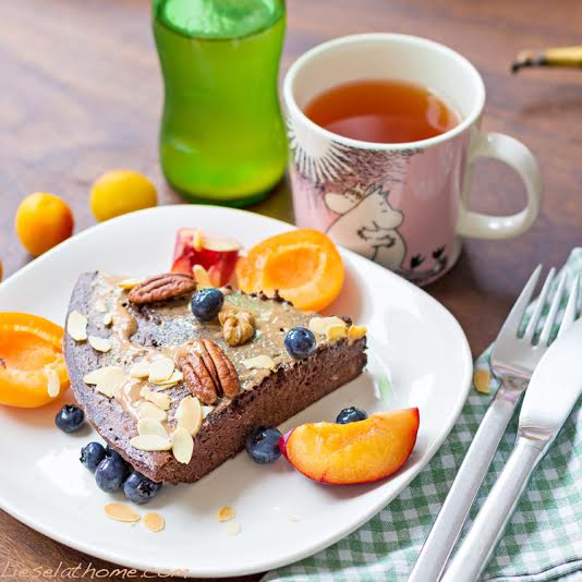 Spread some nut butter over the pancake omelet and sprinkle with nuts and berries.